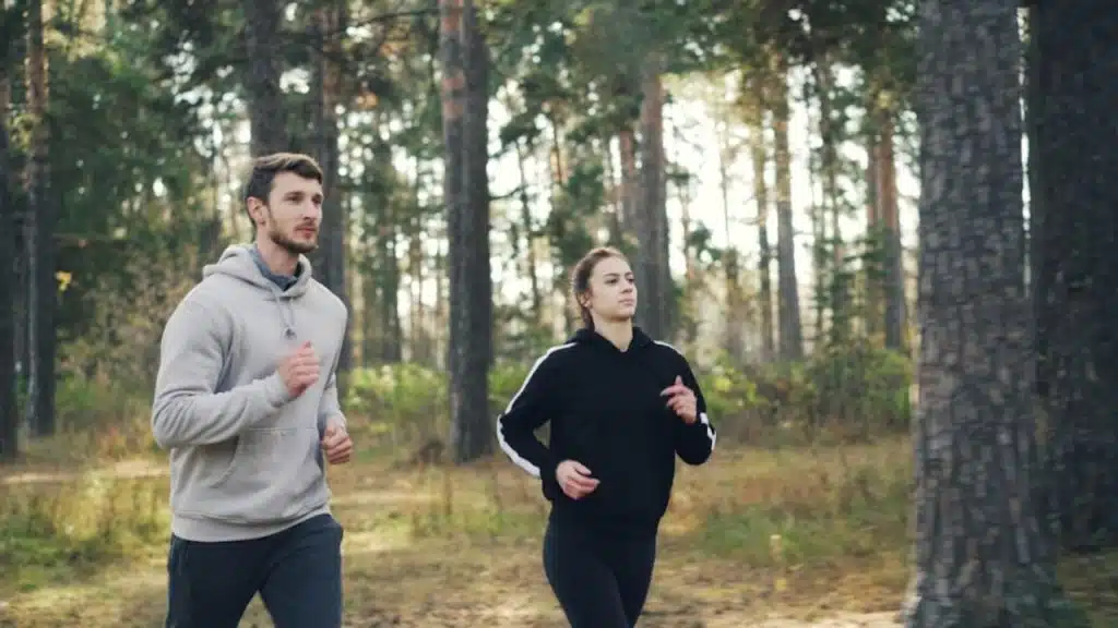 Couple jogging together outdoors