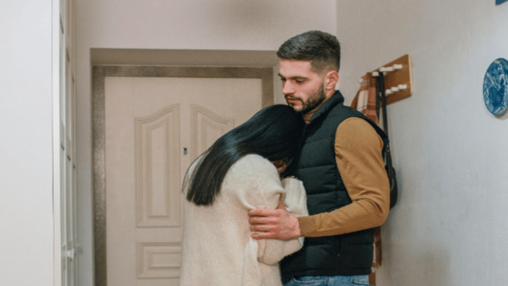 A couple looking upset by the entryway