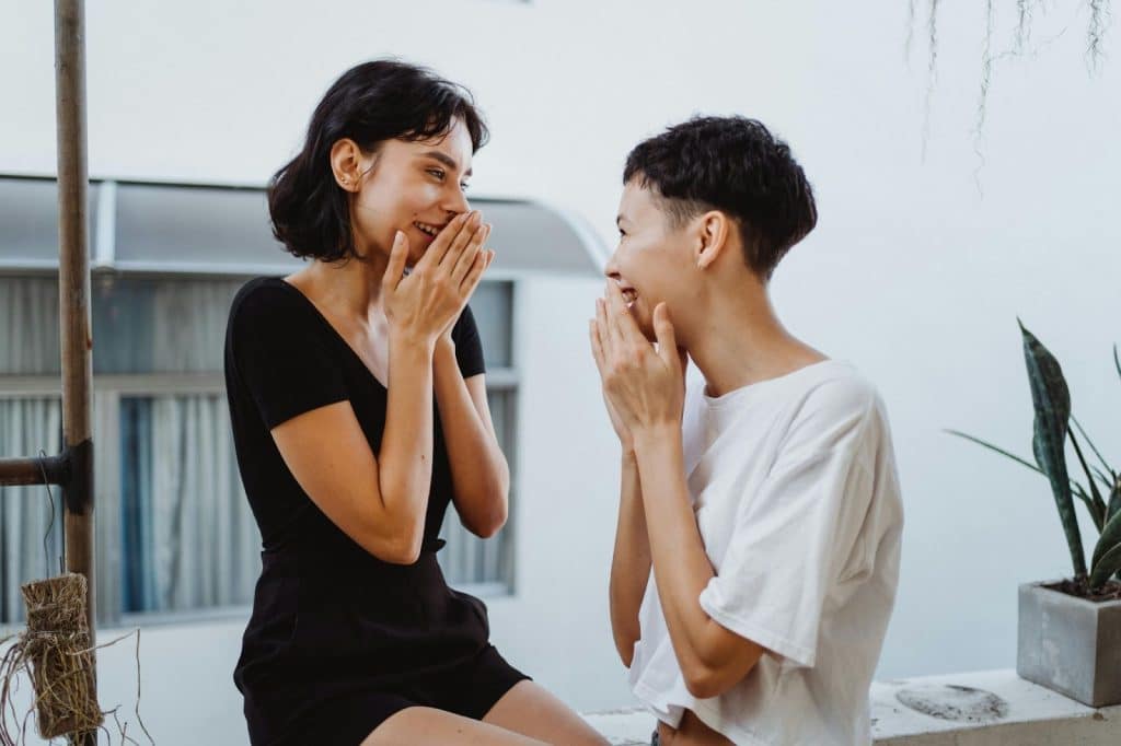 A man and woman laughing together