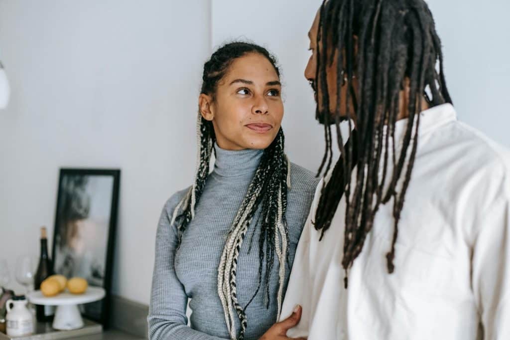 A man and woman looking at each other