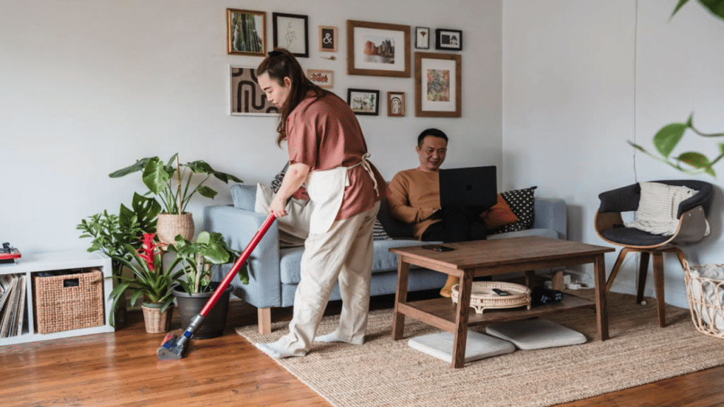 A couple busy at home