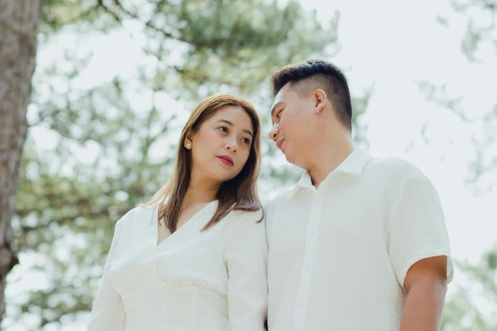 A man looking at the woman