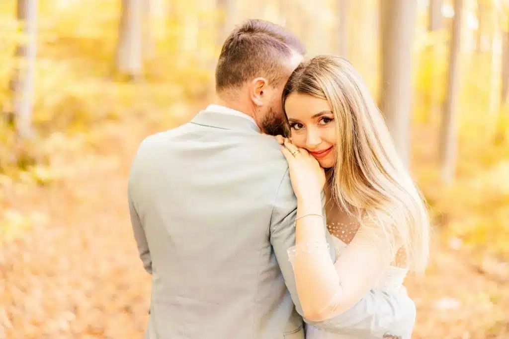 A man and woman hugging each other