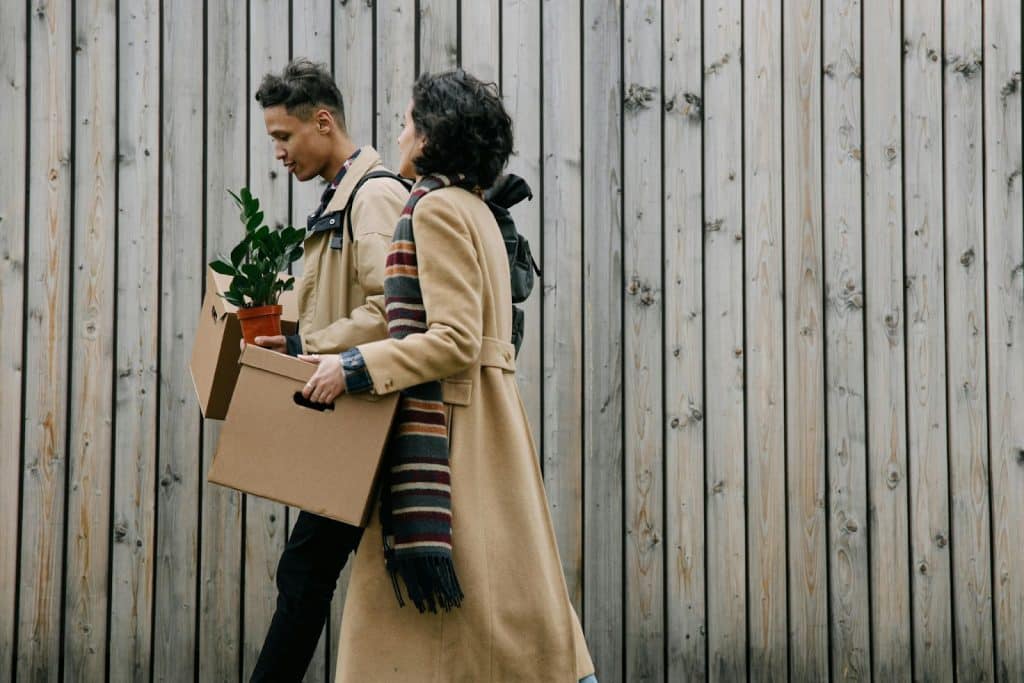A man helping a woman