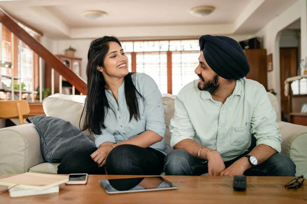 A man and woman laughing together