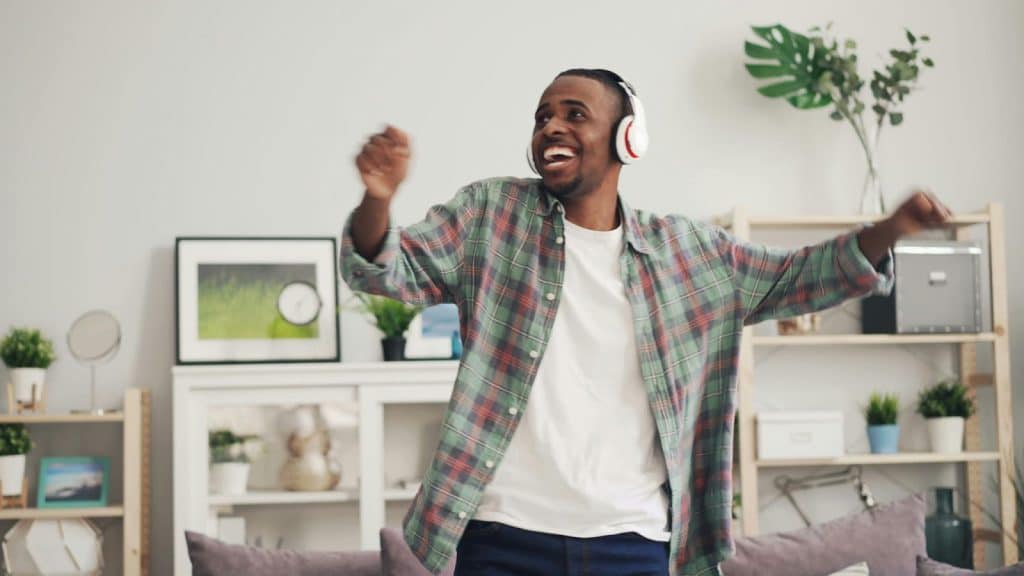 A man dancing at home