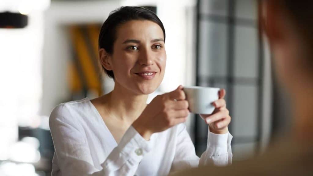 A woman listening carefully during a conversation