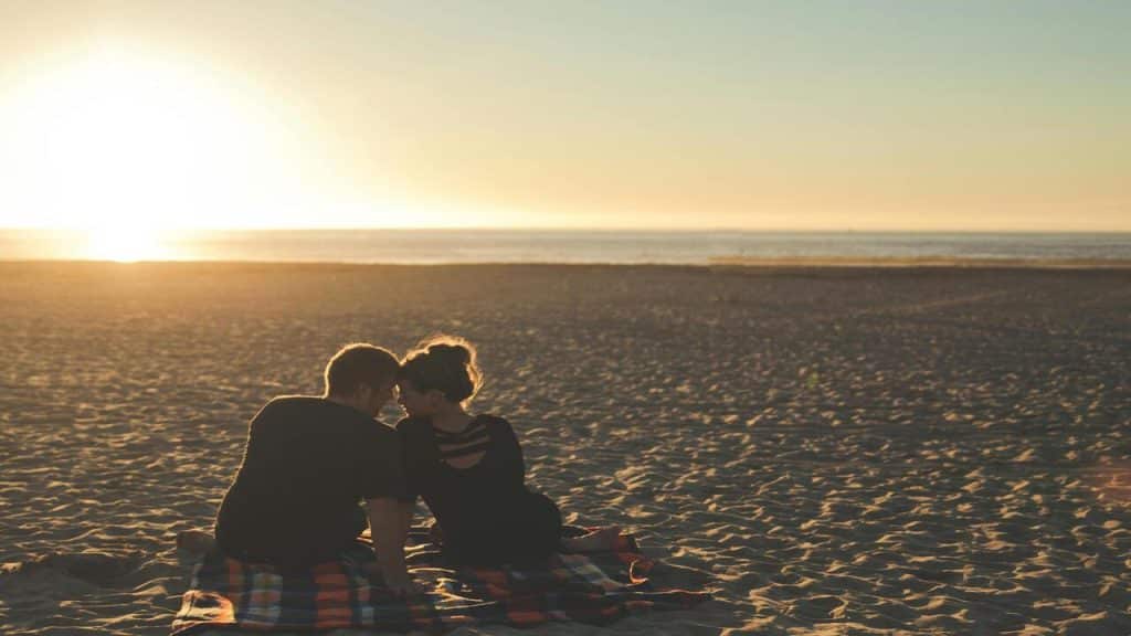 A couple on a beach date