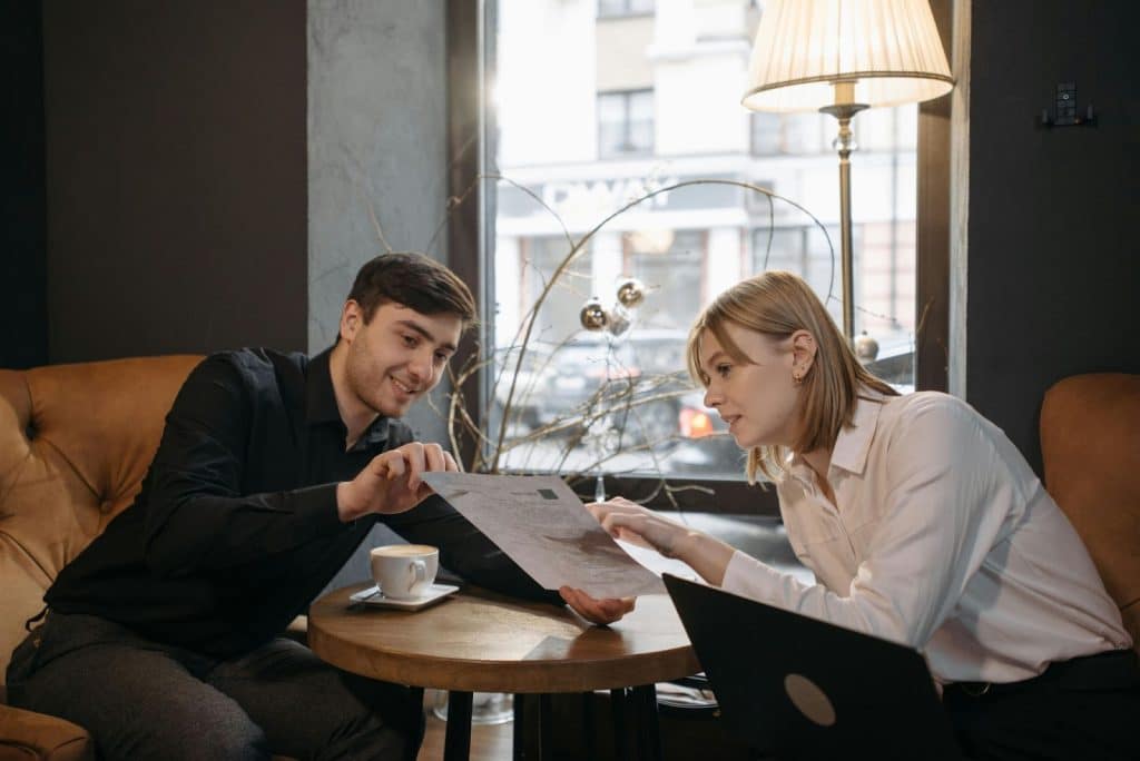 A man and woman at the cafe
