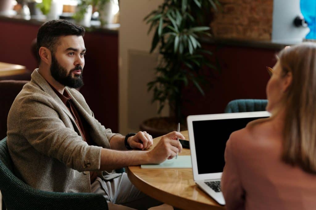 A man and woman talking