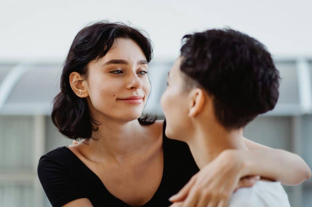 A man and woman looking at each other