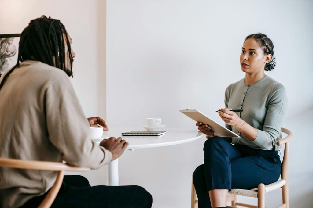 A man and woman talking