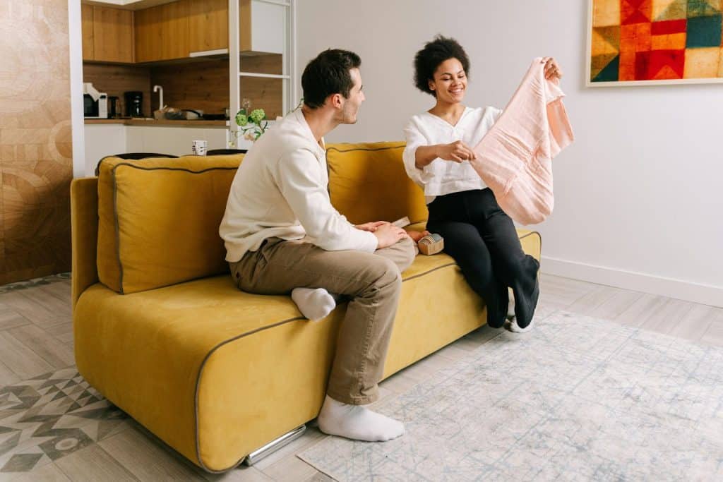 A man interested with what the woman showing