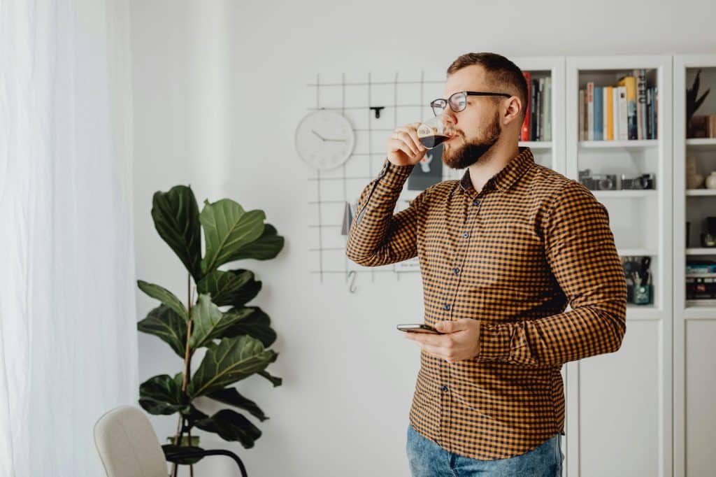 A man drinking a coffee