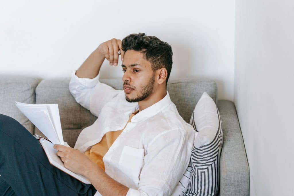 A man holding a paper