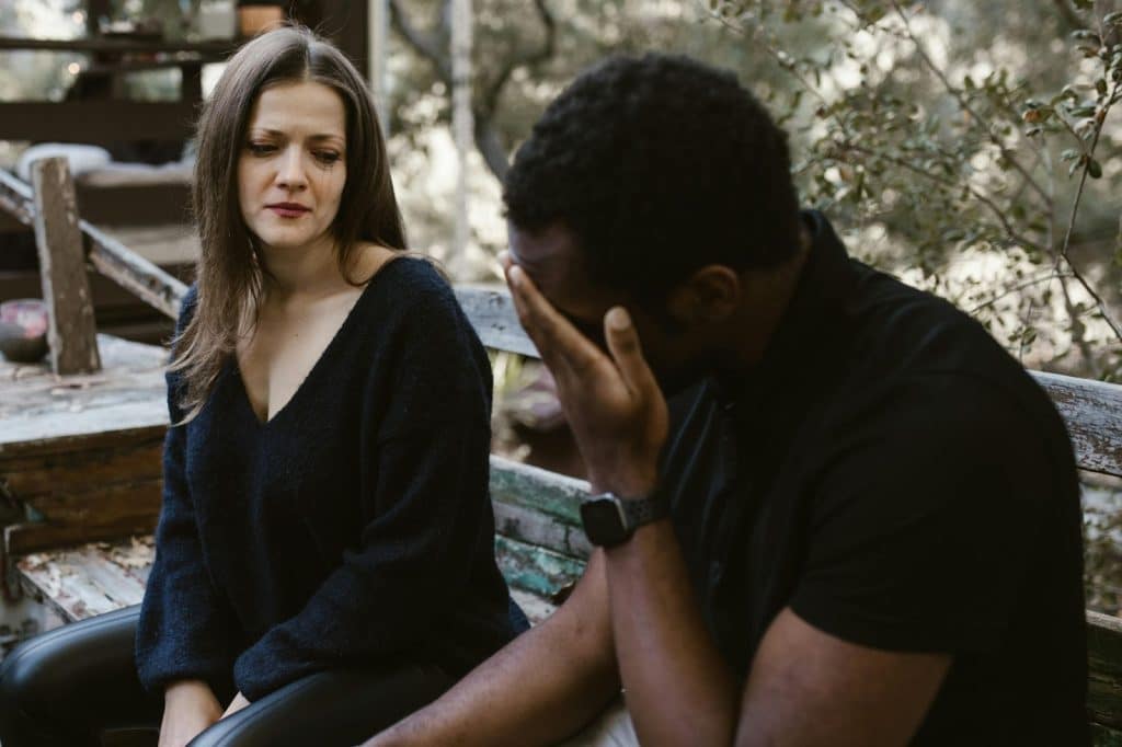 A man and woman talking