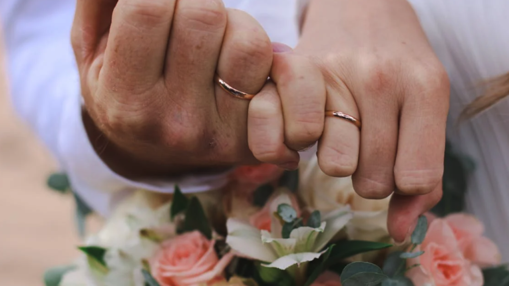A couple doing the pinky promise