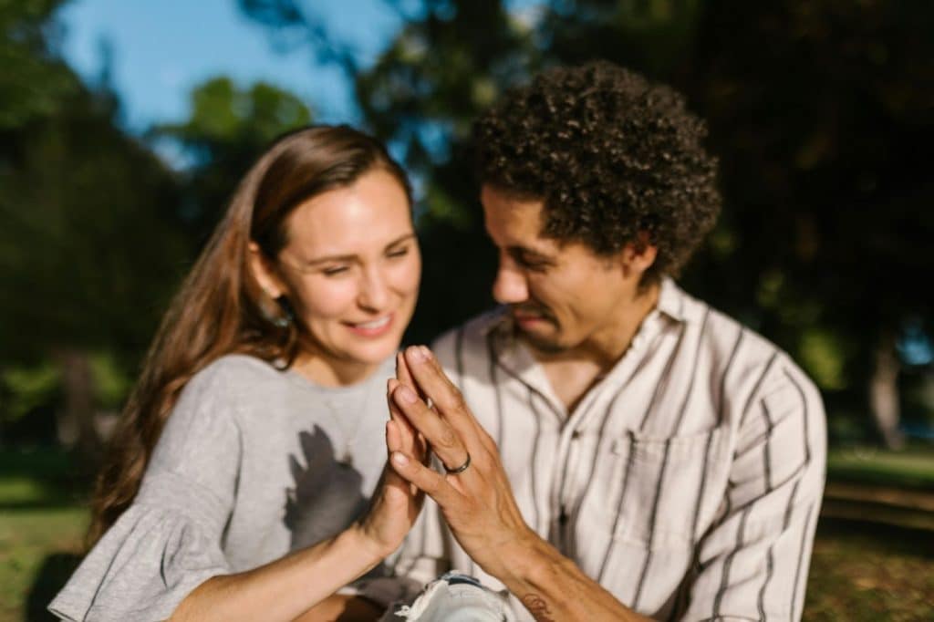 A man and woman being romantic