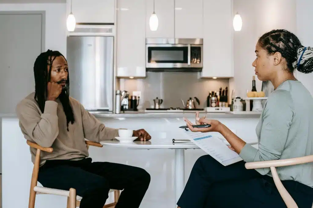 A man and woman talking