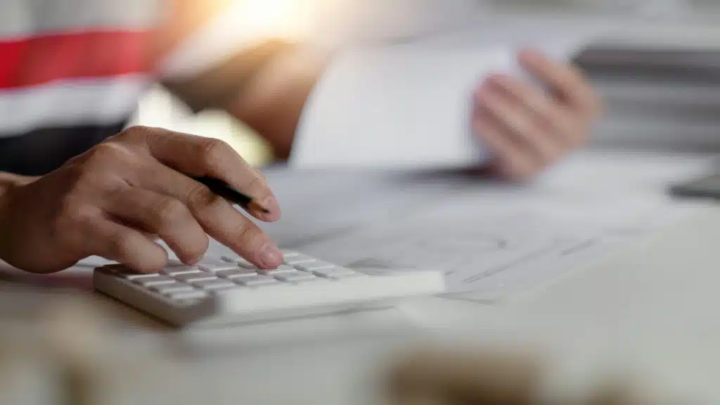 A man doing some bookkeeping at home