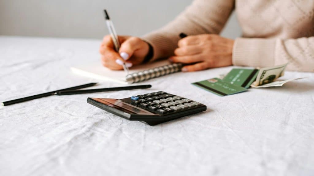 A person calculating credit card debt