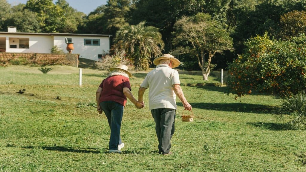 An elderly couple taking a walk