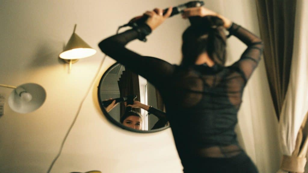 A woman getting ready before a date