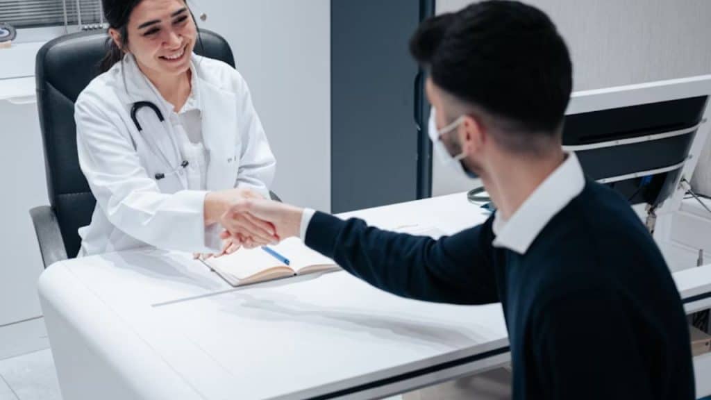 Man consulting with a doctor in a clinic