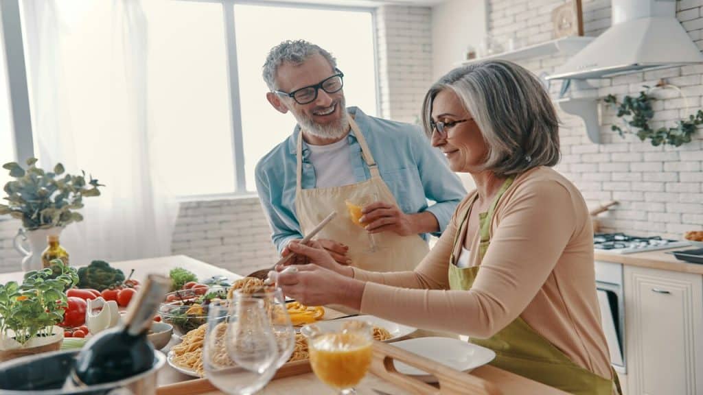 A couple cooking together