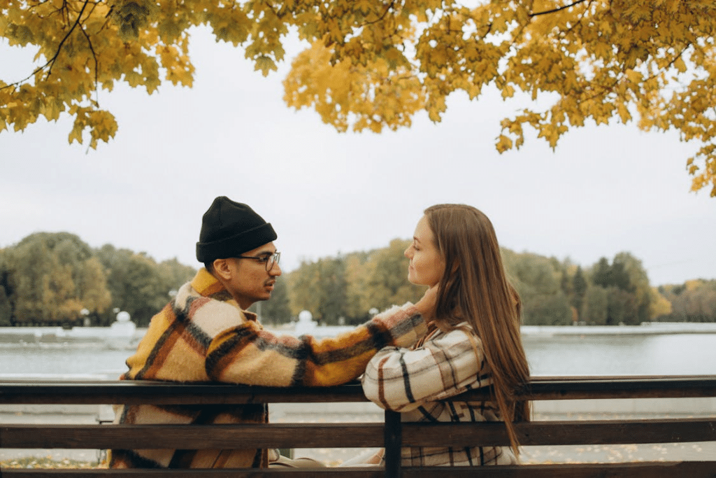 A couple sitting on a bench