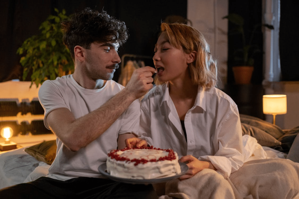 A couple celebrating with a cake
