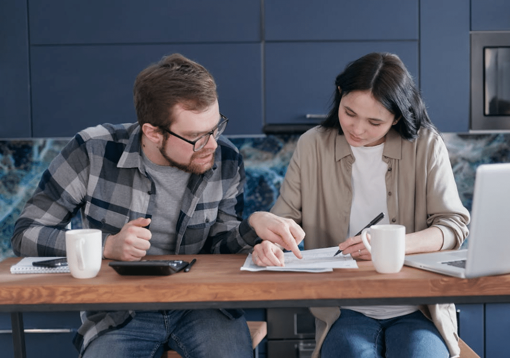A busy couple at a table