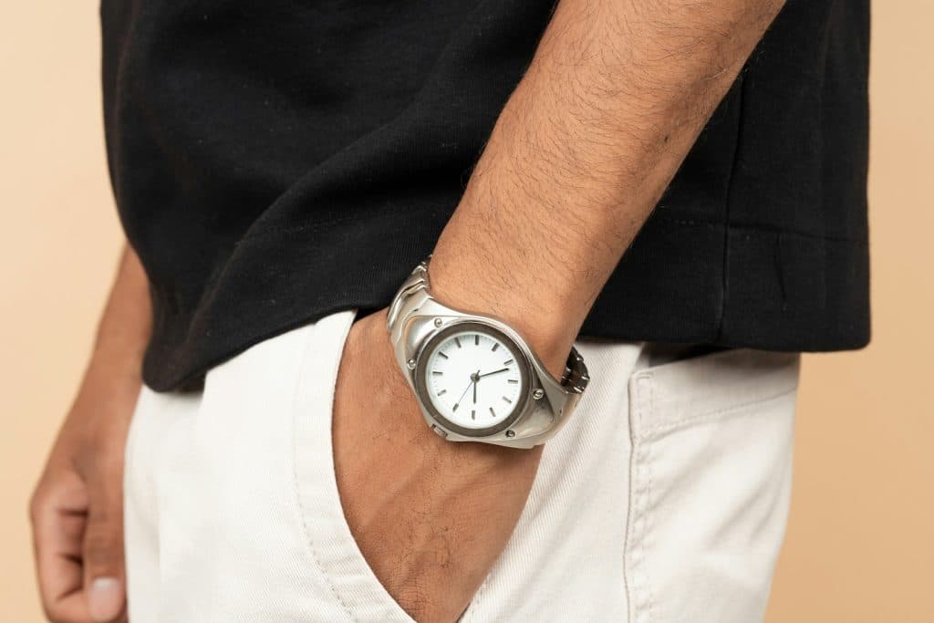 The man has a watch on his wrist.