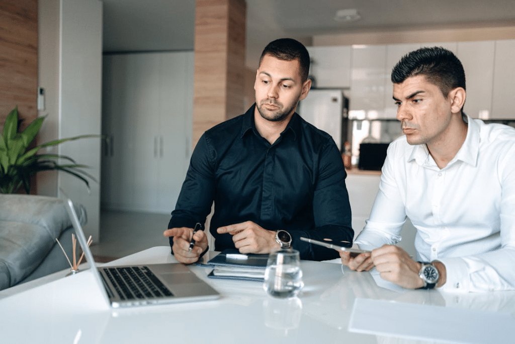 Men in Long Sleeves Shirt Collaborating at Work