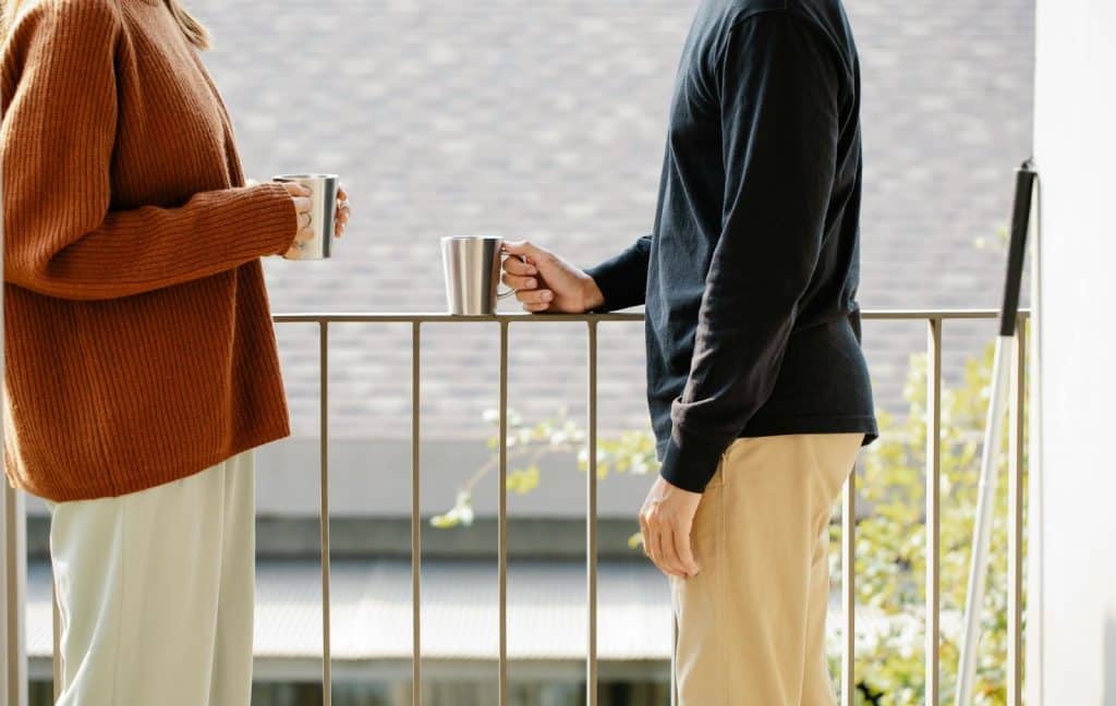 A man and woman standing