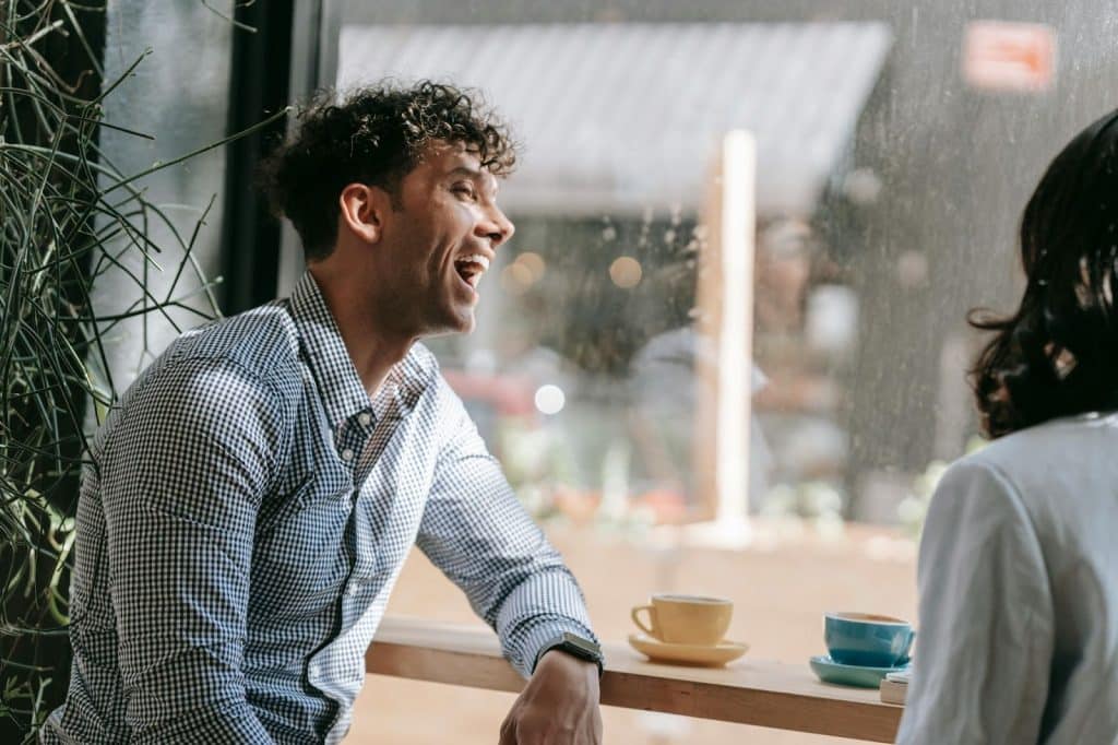 A man happy to talk with woman