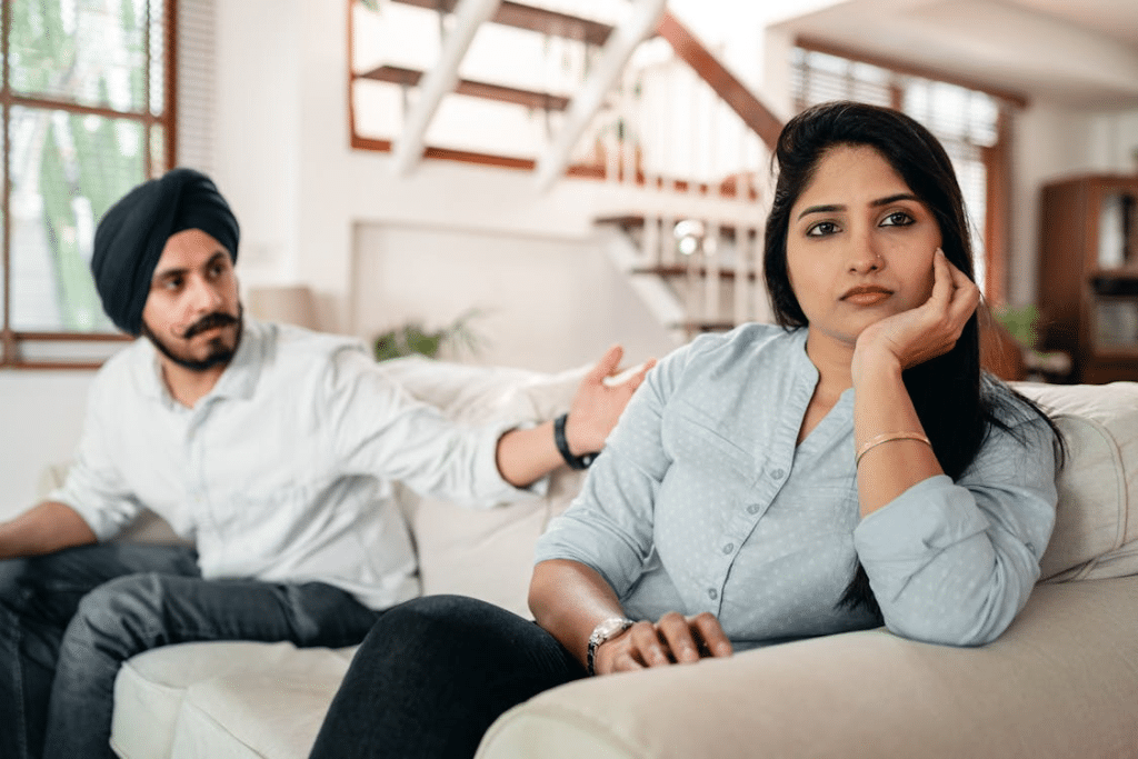 Young couple having quarrel at home