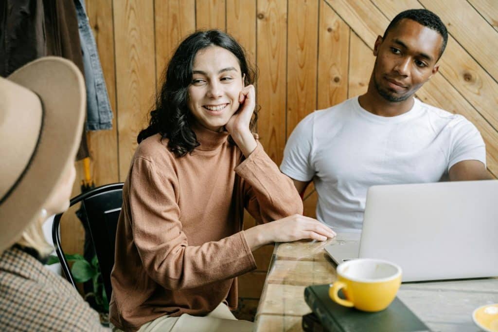 A man helping a woman