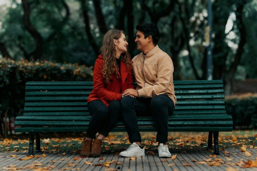 A man and woman hugging each other