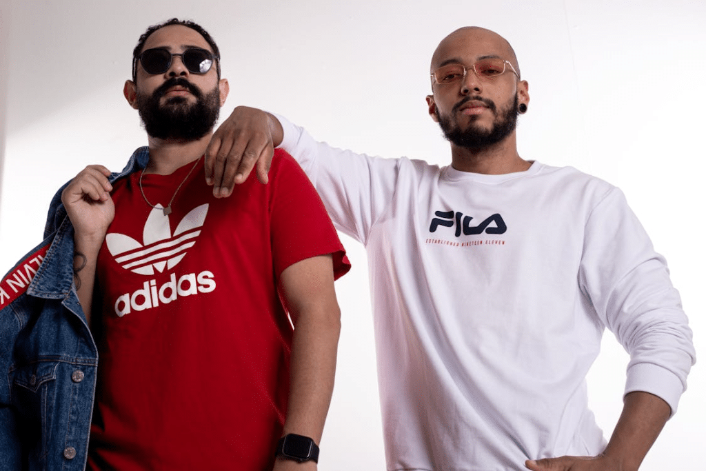 Two Men in Casual Outfits Posing in Studio