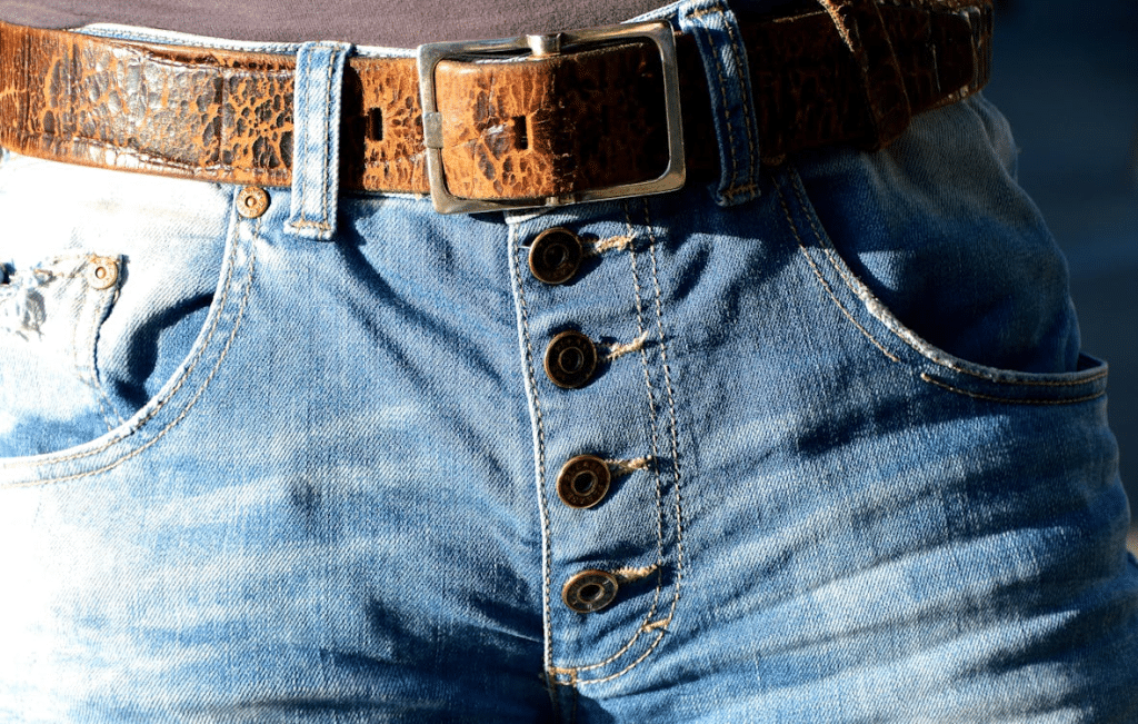 Man wearing a worn out brown belt