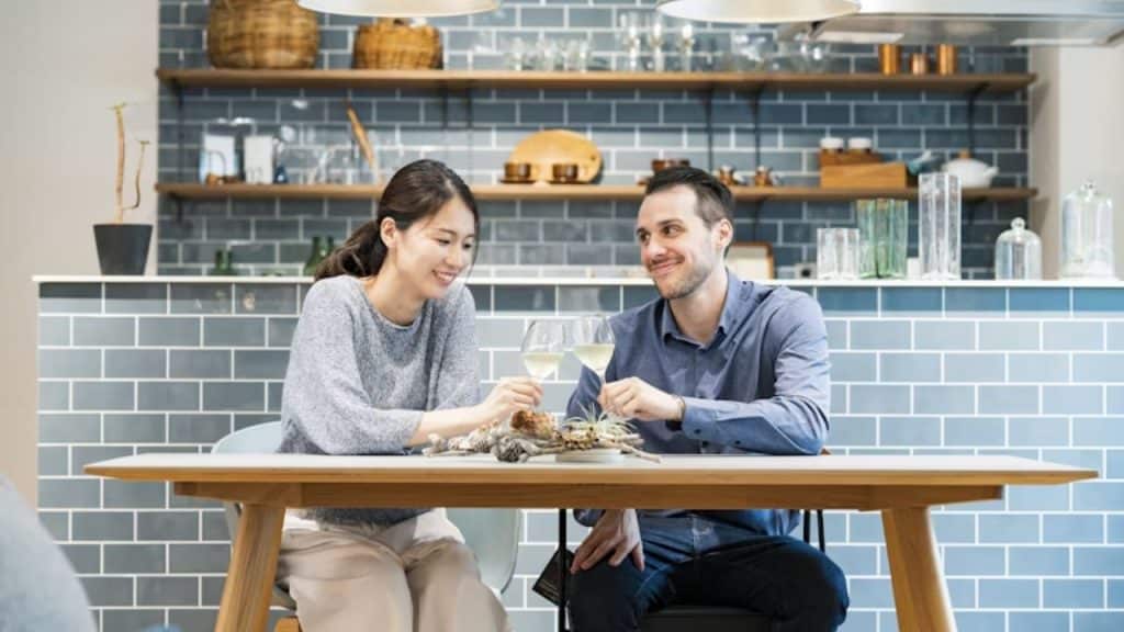 Man smiling as he and his partner handle an unexpected situation