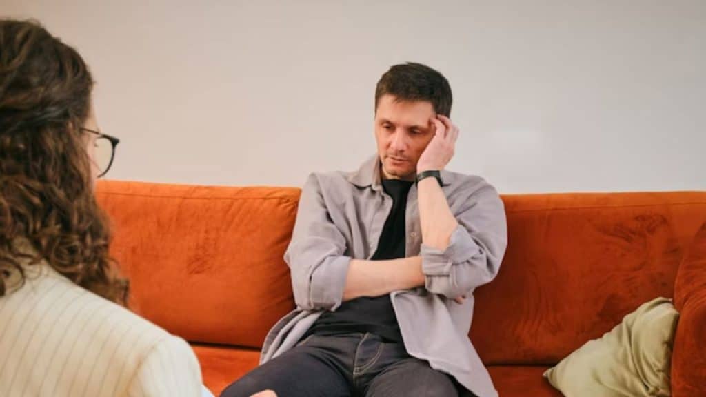 Man opening up emotionally during a quiet talk