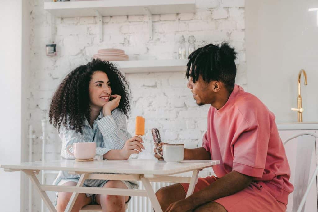 The couple is talking to each other.