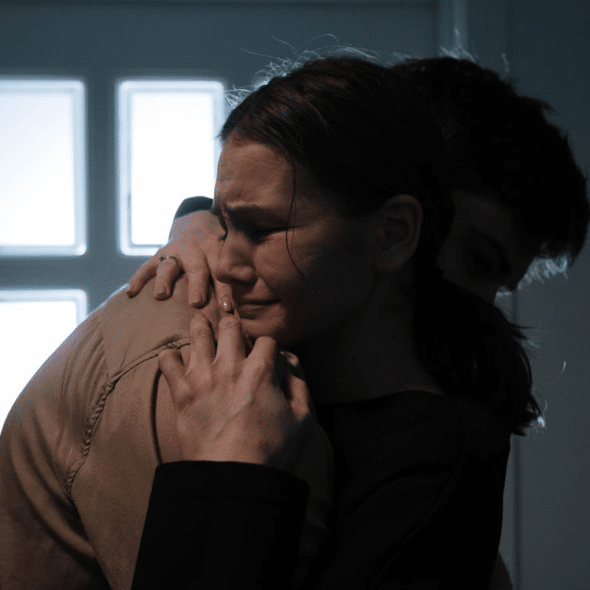 Woman Embracing a Man and Crying.