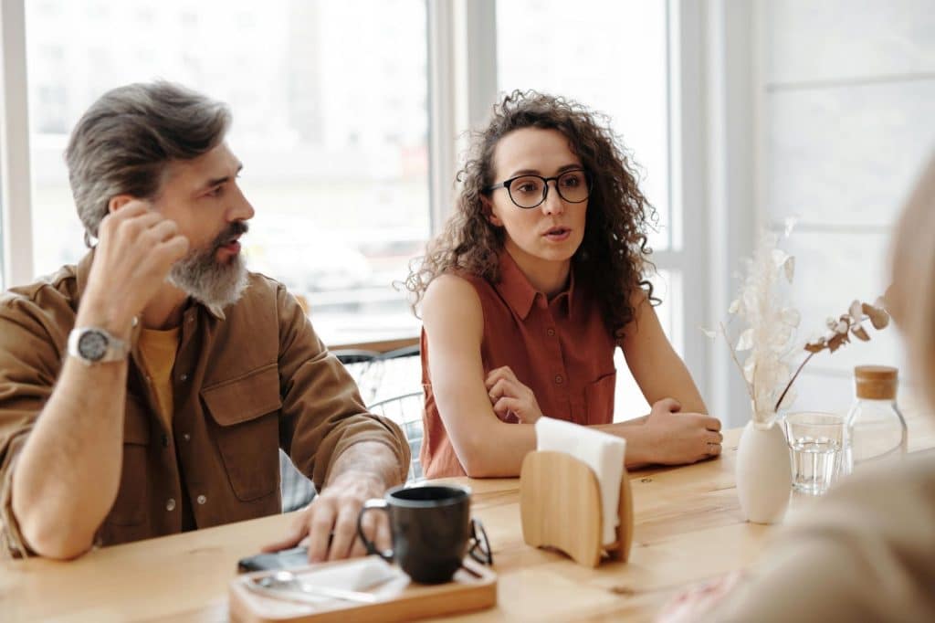A man and woman talking