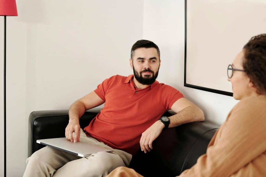 A man and woman talking.