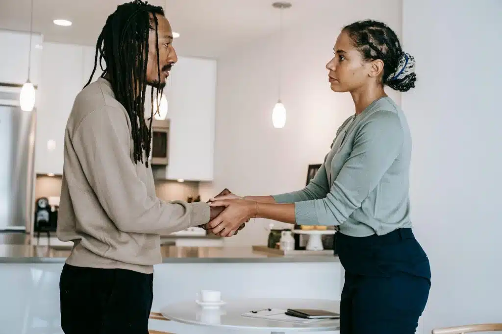 A man and woman holding hands