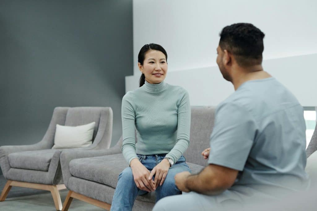 A man and woman talking
