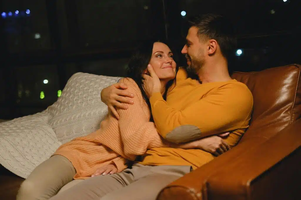 A man and woman having a moment together